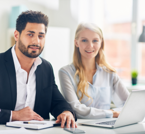 two co workers working together